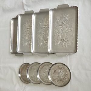 Vintage aluminum small trays and coasters. Fruit design